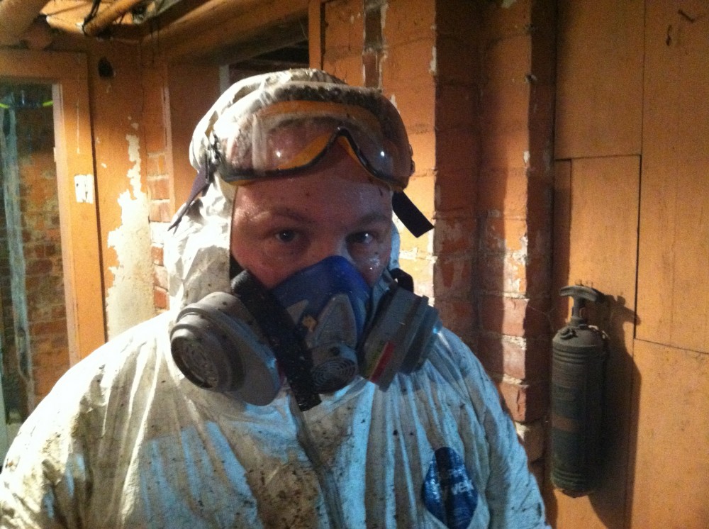 Asbestos removal was a days-long steaming hot mess of exhaustion.